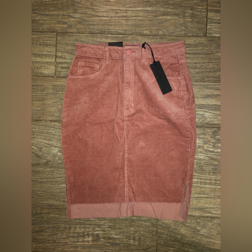 Rose gold corduroy mini skirt. Size m/l